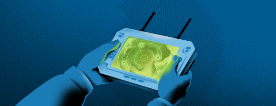 Someone holding a handheld GPS device