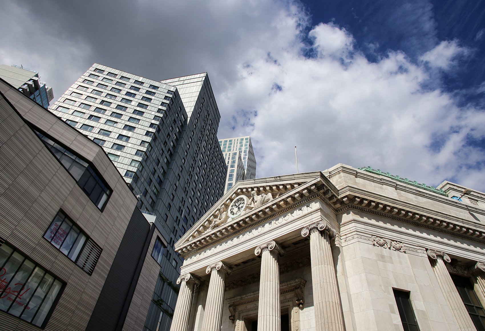 Highrise office tower and neoclassical building at Albee Square by the Fulton Street Mall in Fort Greene, Brooklyn, New York City