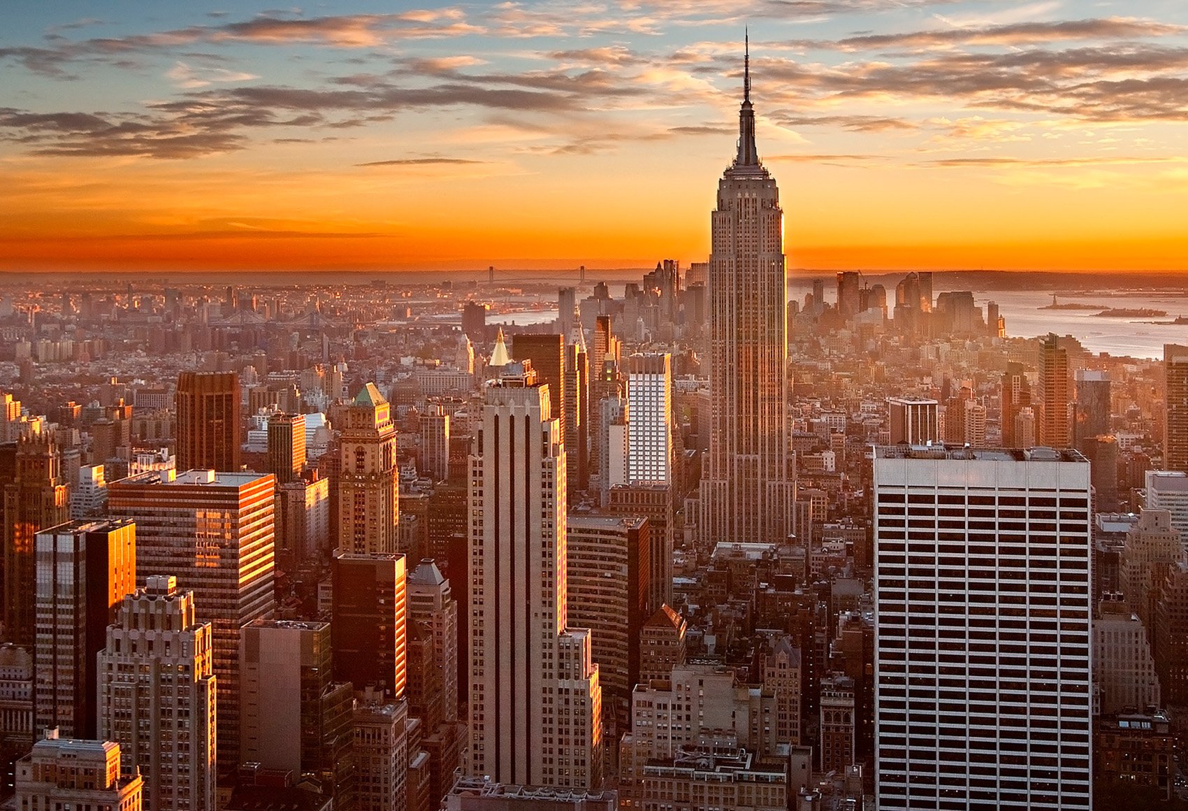 Skyline view of the Empire State Building and downtown New York City at sunset