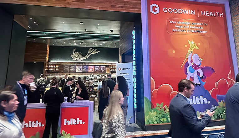 Goodwin branded stage with audience at HLTH USA 2025.
