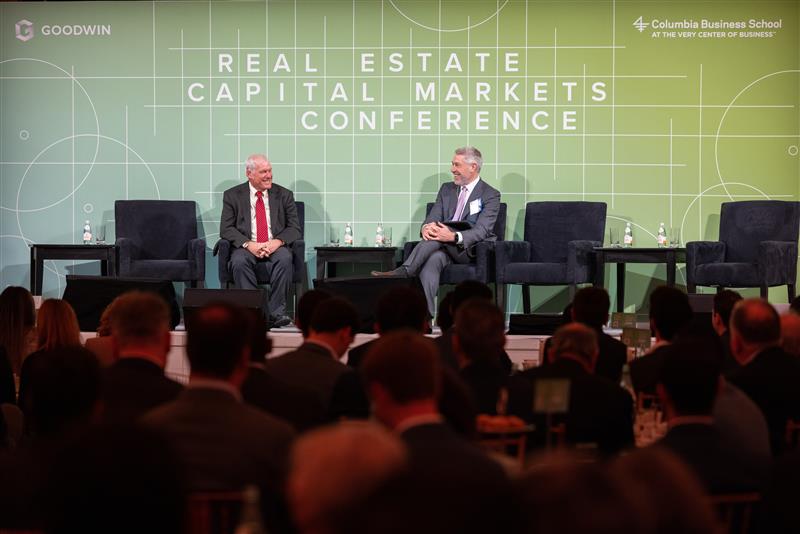 Keynote speaker addressing attendees at the Goodwin real estate capital markets conference.