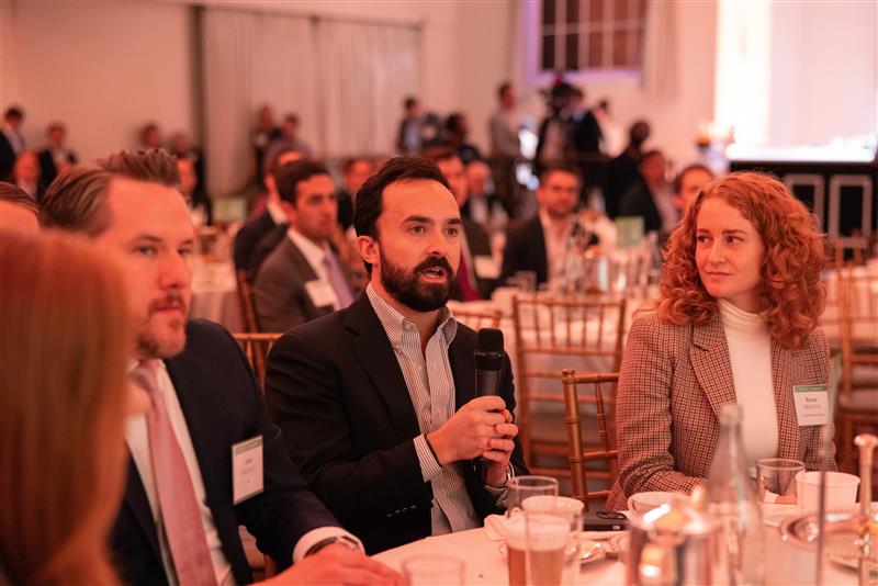 Audience listening during a session at the Goodwin real estate conference.