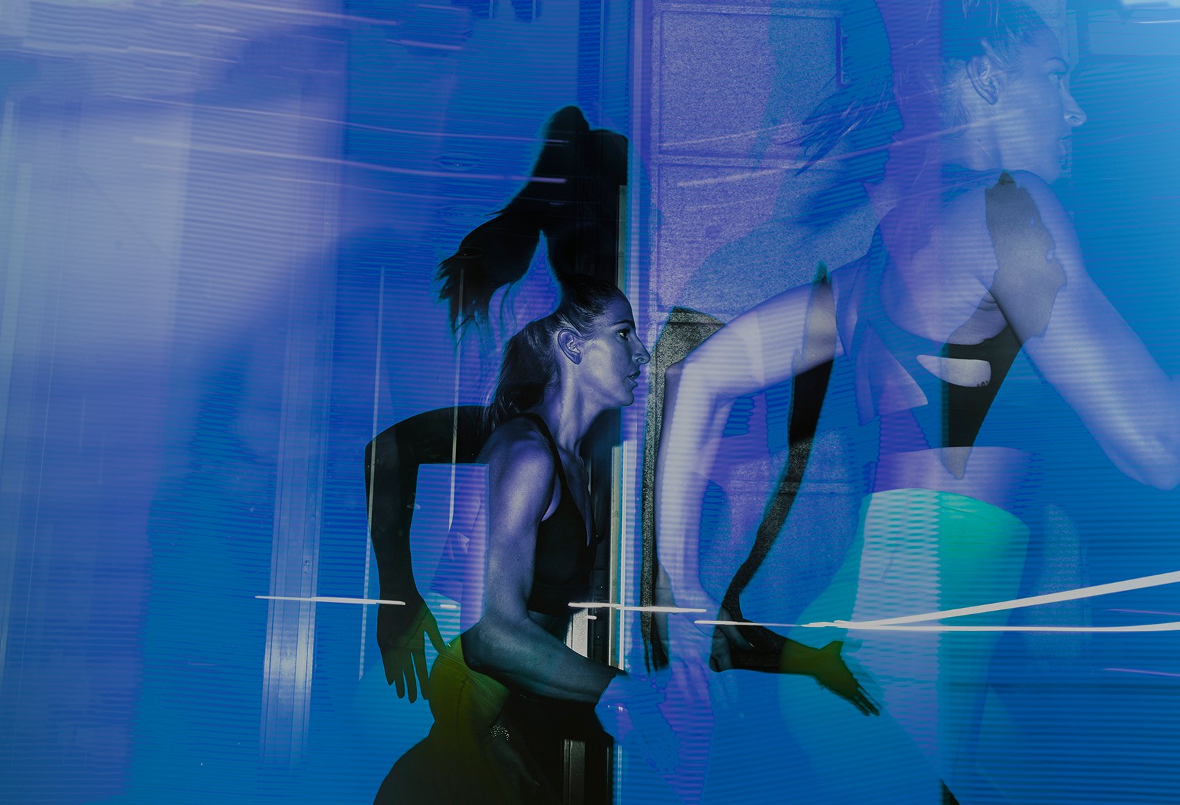 Blurred, high contrast image of a woman in motion